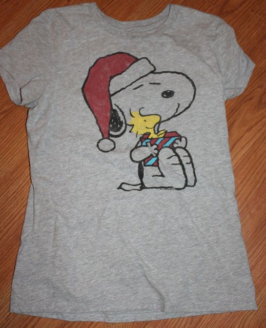 Nice lot of 2 Ts. Lucky Charms T is size XXL. The Snoopy T is a L 