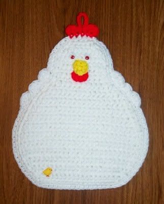 THIS DECORATIVE CHICKEN POTHOLDER WILL ADD A BIT OF WHIMSY TO YOUR 