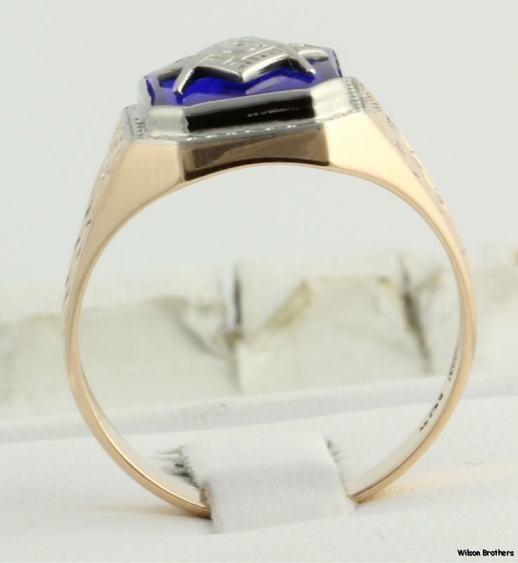 This ring weighs 5.2 grams . The face measures 5/8 (15.8mm) tall 